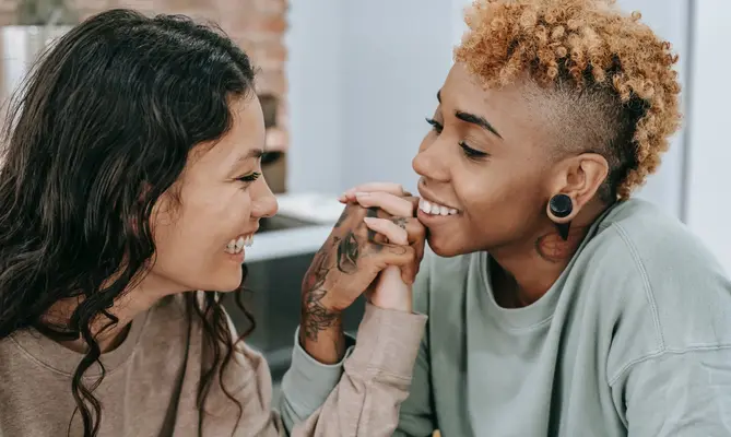 Lesbian couple smiling together