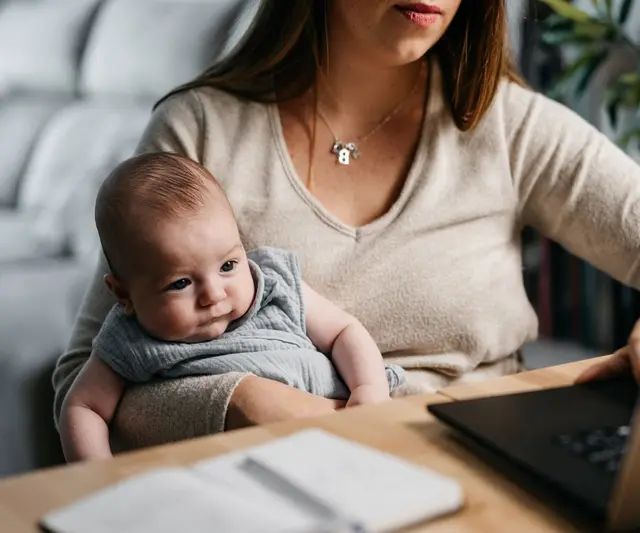 A patient and their partner reviewing a transparent fertility treatment cost sheet